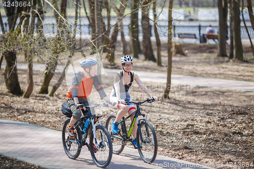 Image of Athletes on bicycles in park