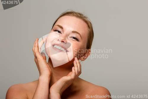 Image of Beautiful model on gray background