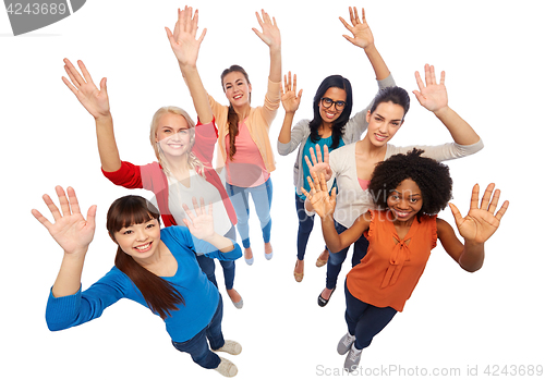 Image of international group of happy smiling women