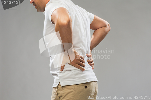 Image of close up of man suffering from backache