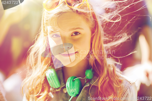 Image of happy teenage girl with headphones