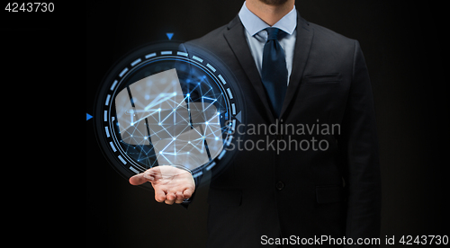 Image of businessman with virtual projection over black