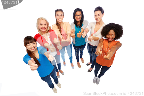Image of international group of women showing thumbs up