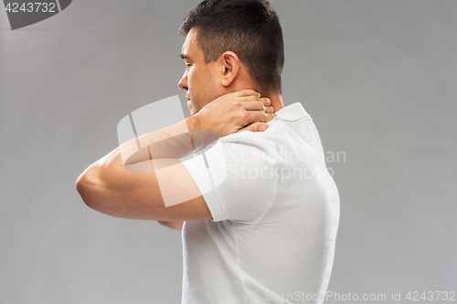 Image of close up of man suffering from neck pain