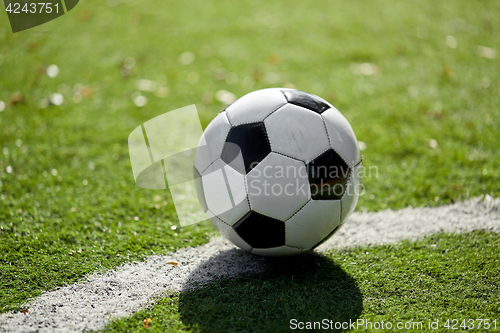 Image of soccer ball on football field