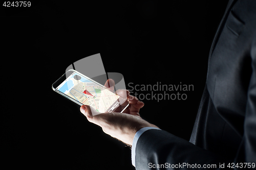 Image of close up of businessman with gps map on smartphone