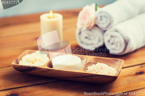 Image of close up of soap, himalayan salt and scrub in bowl