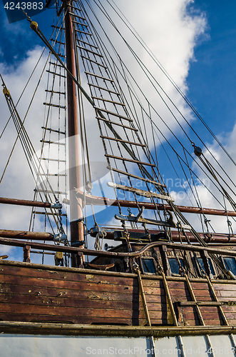 Image of Old collapsing sailboats at the dock, close-up