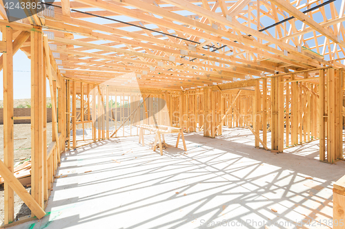 Image of Wood Home Framing Abstract At Construction Site.