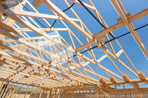 Image of Wood Home Framing Abstract At Construction Site.