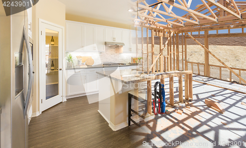 Image of Transition of Beautiful New Home Kitchen From Framing To Complet