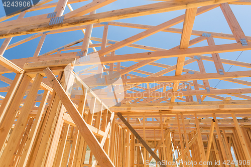 Image of Wood Home Framing Abstract At Construction Site.