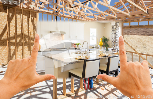 Image of Hands Framing Transition of New Home Kitchen From Framing To Com