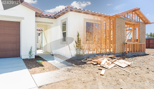 Image of Transition of New Home From Framing To Completion