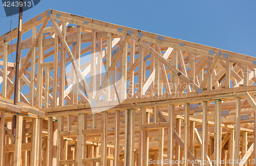 Image of Wood Home Framing Abstract At Construction Site.