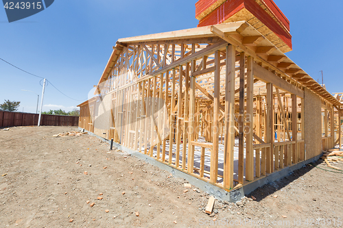 Image of Wood Home Framing Abstract At Construction Site.