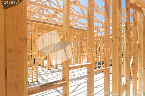 Image of Wood Home Framing Abstract At Construction Site.