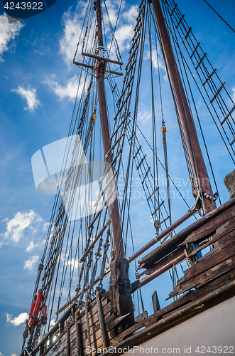 Image of Old collapsing sailboats at the dock, close-up