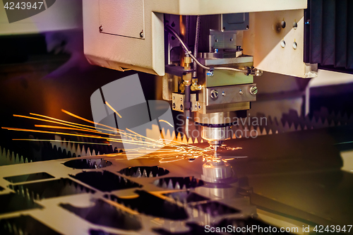 Image of CNC Laser cutting of metal, modern industrial technology.