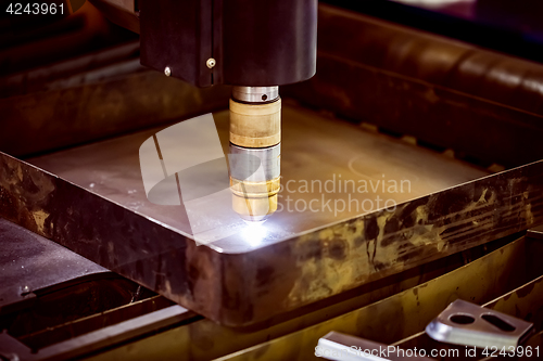 Image of CNC Laser plasma cutting of metal, modern industrial technology.