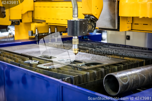 Image of CNC Laser plasma cutting of metal, modern industrial technology.