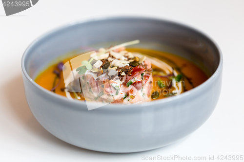 Image of close up of vegetable pumpkin-ginger soup in bowl