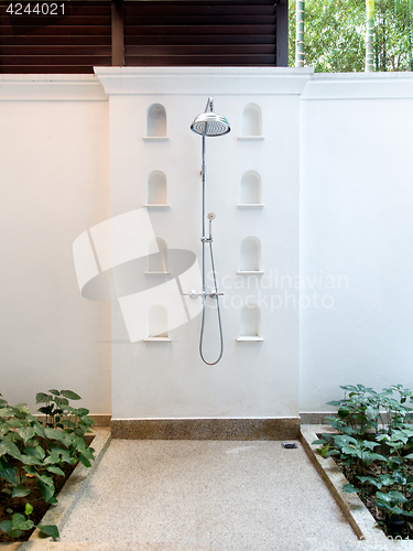 Image of outdoor shower at exotic hotel