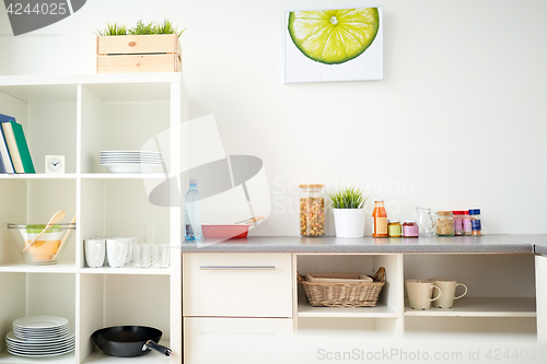 Image of modern home kitchen interior with food on table