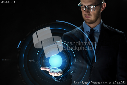 Image of close up of businessman with virtual projection