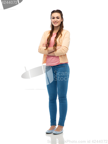 Image of happy smiling young woman in cardigan and jeans