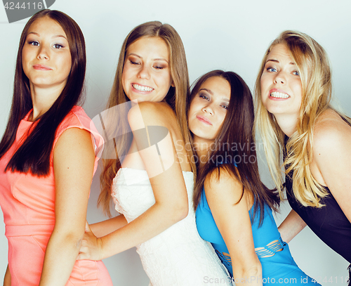 Image of group of many cool modern girls friends in bright clothers together having fun isolated on white background, happy smiling lifestyle people concept