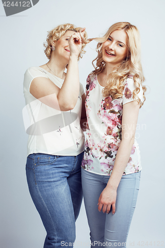 Image of mother with daughter together posing happy smiling isolated on white background with copyspace, lifestyle people concept closeup