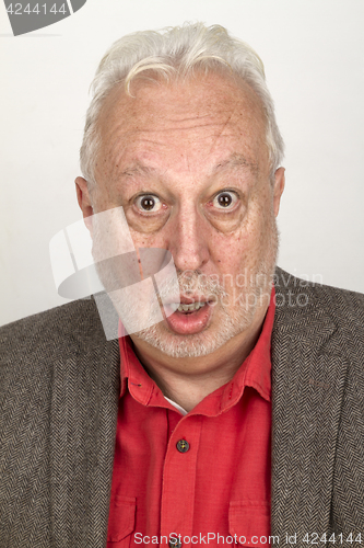 Image of Senior man looking astonished