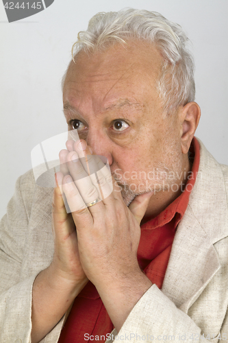 Image of Frightened male senior