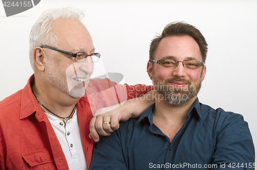 Image of Gay couple looking happy