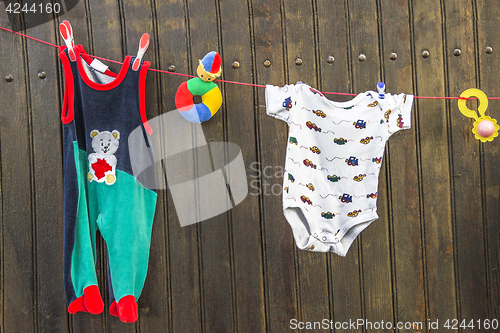 Image of Clothesline with children\'s clothes