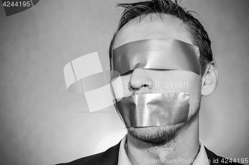 Image of Man with sellotape