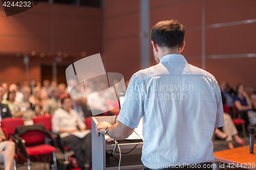 Image of Public speaker giving talk at scientific conference.