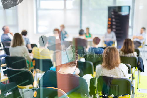 Image of Round table discussion at business and entrepreneurship convention.