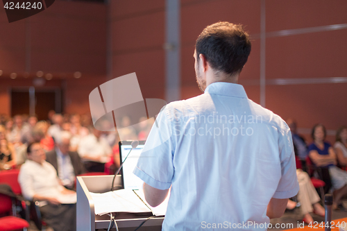 Image of Public speaker giving talk at scientific conference.