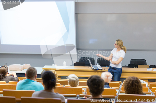 Image of Instructor teaching first aid cardiopulmonary resuscitation workshop.