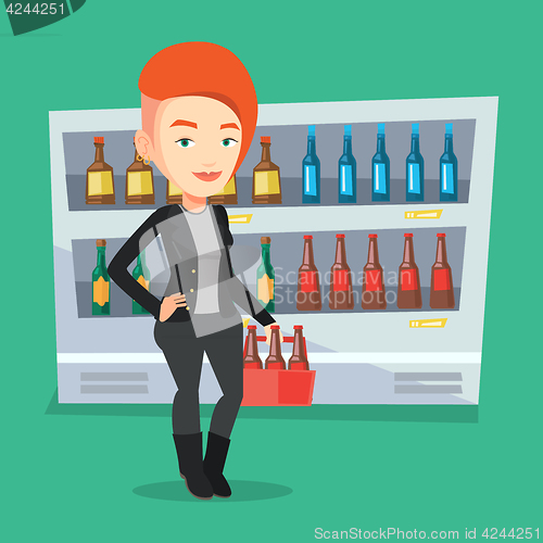 Image of Woman with pack of beer at supermarket.