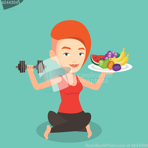 Image of Healthy woman with fruits and dumbbell.