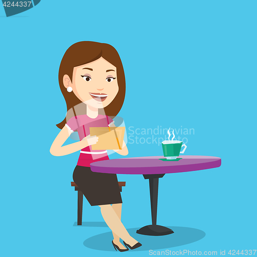 Image of Woman surfing in the social network in cafe.