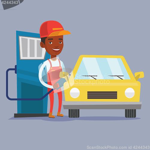 Image of Worker filling up fuel into car.