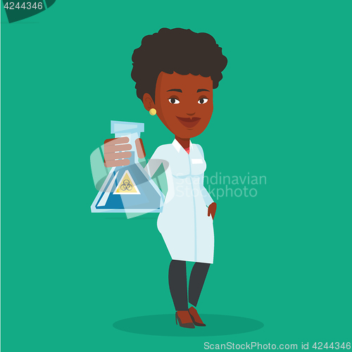 Image of Scientist holding flask with biohazard sign.