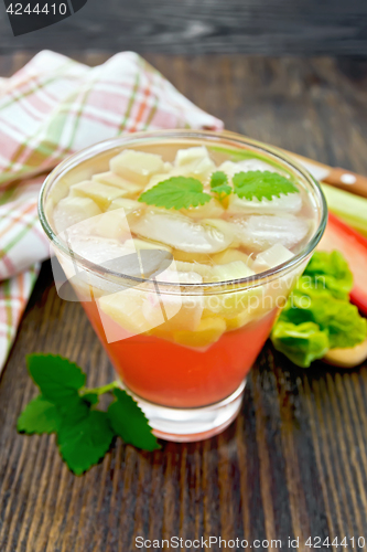 Image of Lemonade with rhubarb and mint on wooden table