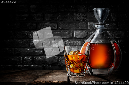 Image of Whiskey and brick wall
