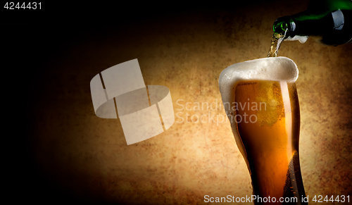 Image of Beer pouring into glass