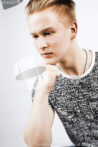 Image of young handsome teenage hipster guy posing emotional, happy smiling against white background isolated, lifestyle people concept closeup
